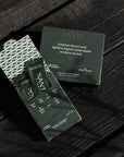 Sante dietary supplement packaging on a dark wooden surface